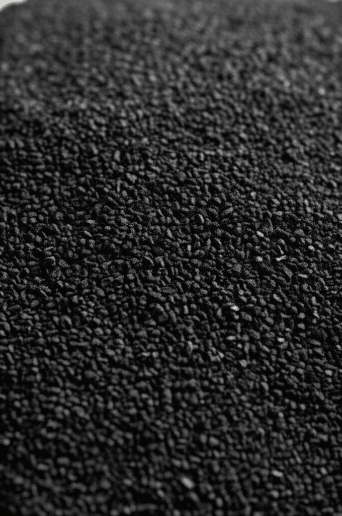 Close-up of coconut shell-derived activated carbon granules